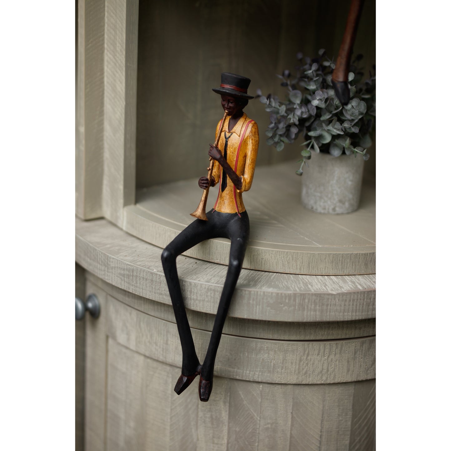 Sitting Trumpeter