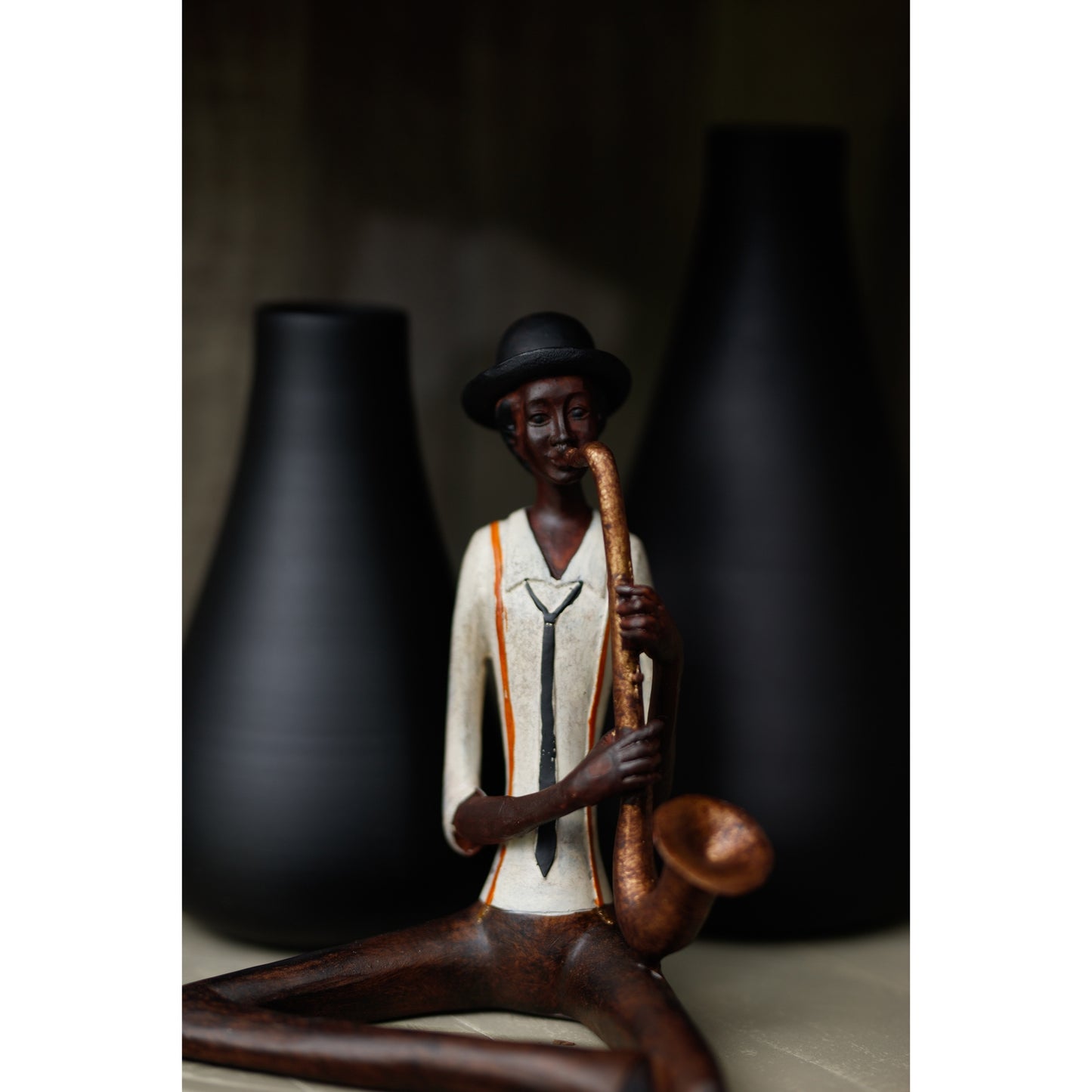 Sitting Saxaphonist