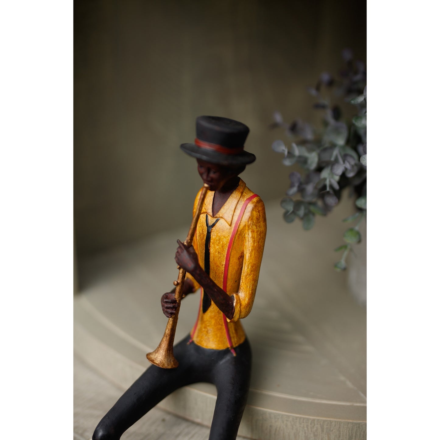 Sitting Trumpeter