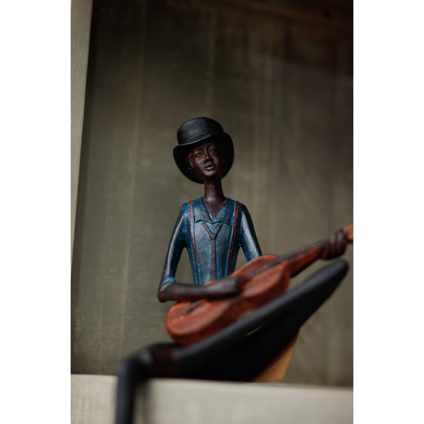 Sitting Strings Player